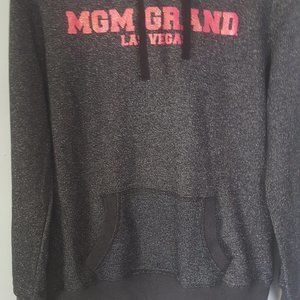 HOODIE. COLOR: BLACK WITH PINK DETAILS  SIZE: L  BY: MGM GRAND